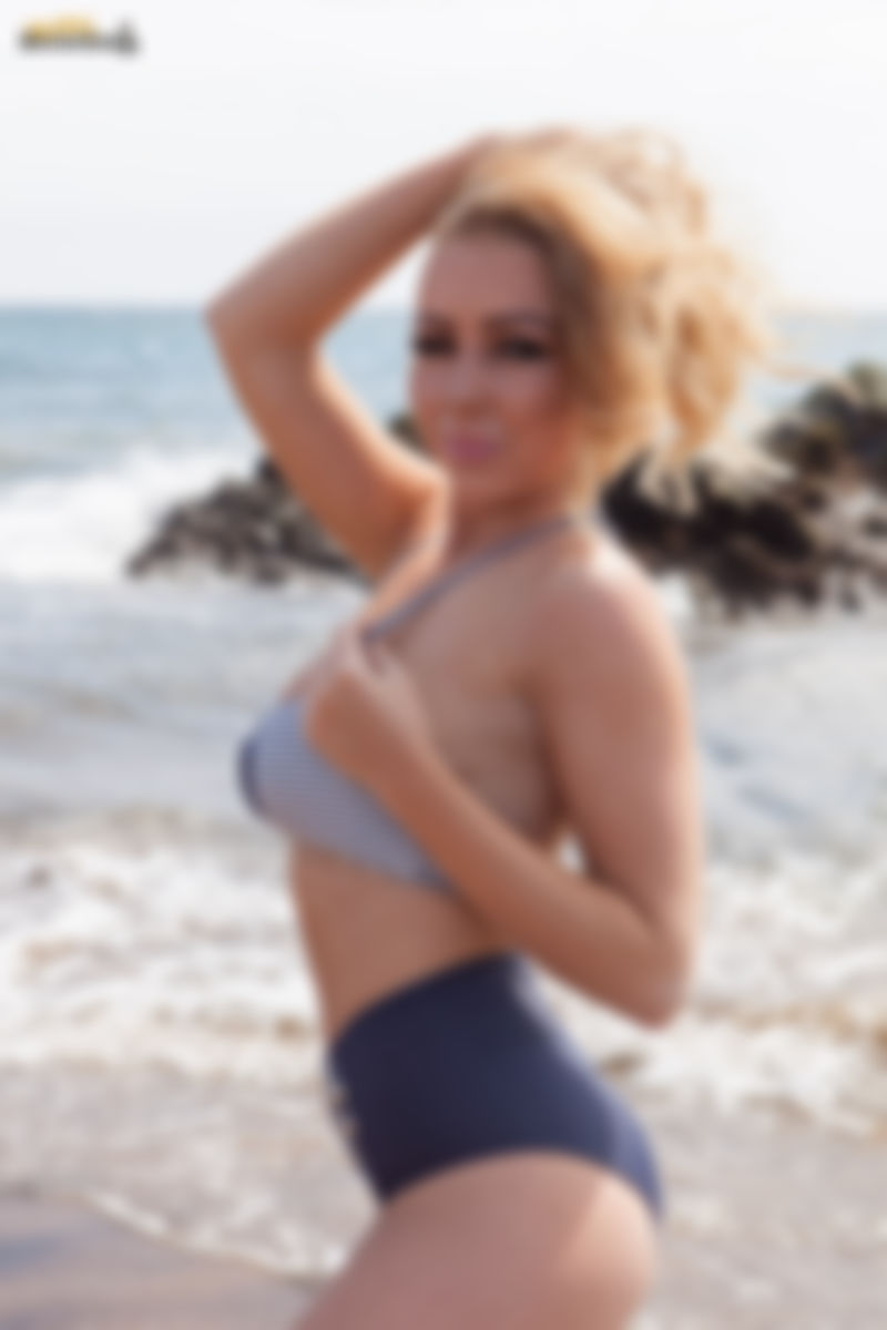 Big Boobs On The Beach