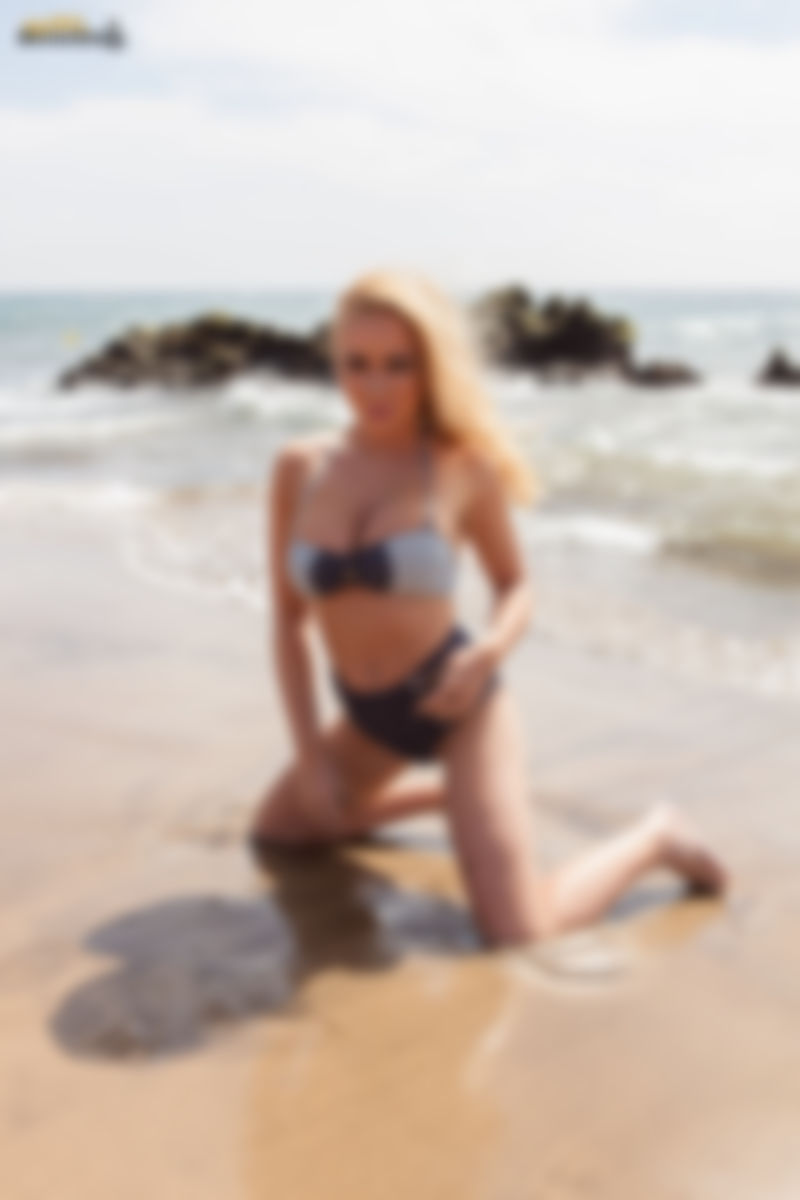 Big Boobs On The Beach