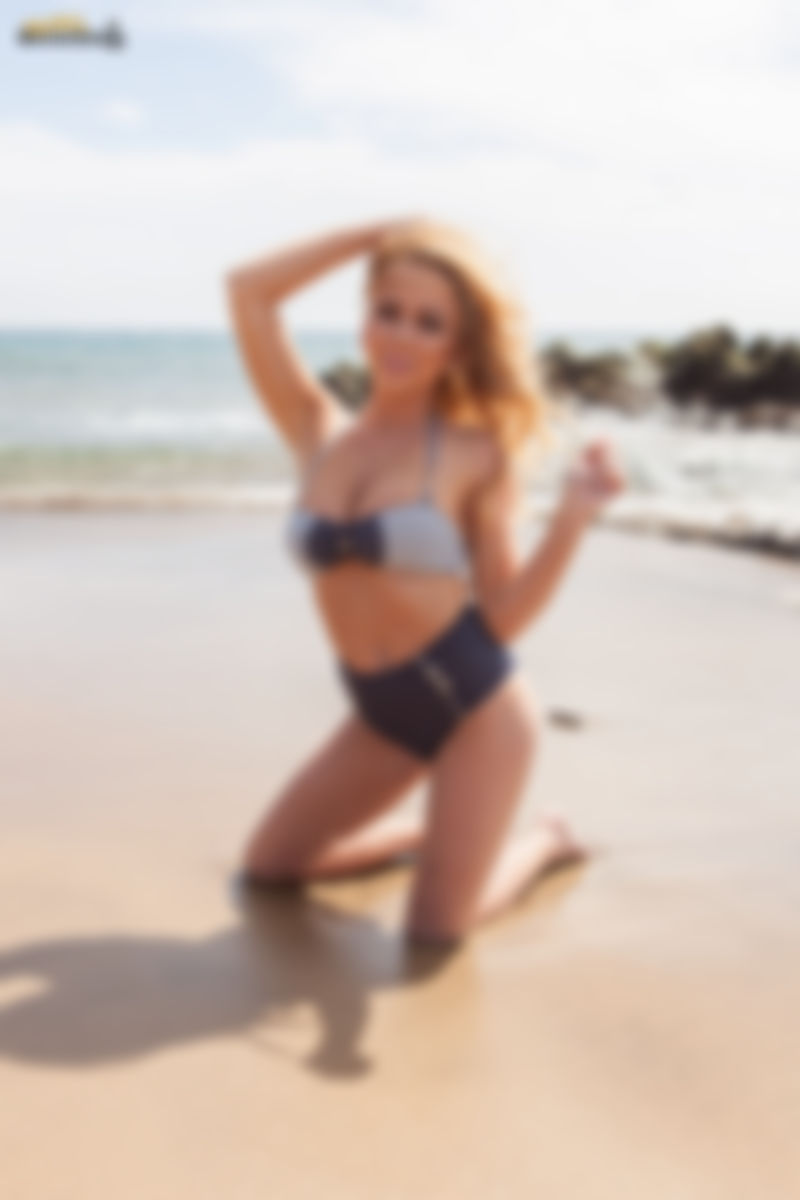 Big Boobs On The Beach