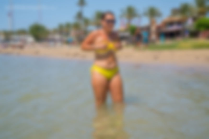 Yellow Bikini On The Beach